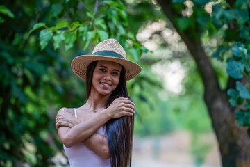 Woman in Straw Hat in Green Park