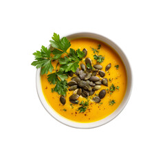 Delicious Creamy Pumpkin Soup with Toasted Pumpkin Seeds and Parsley Garnish