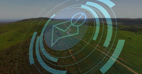 Hovering digital map pin icon with concentric circles over aerial fields showing augmented reality