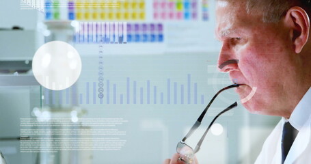 Studying scientist wearing lab coat holding eyeglasses, analyzing data overlays in lab, copy space