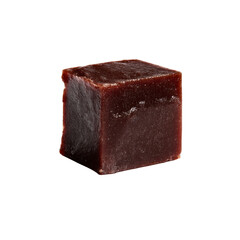 Single Cube of Dark Brown Fudge Candy Isolated on Black Background
