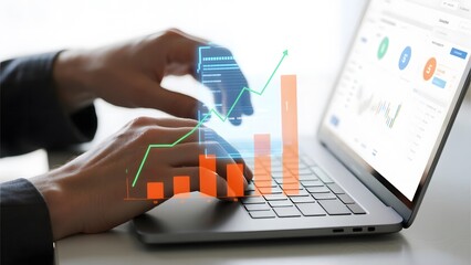 Businessman analyzing financial data on a laptop with graphical overlays