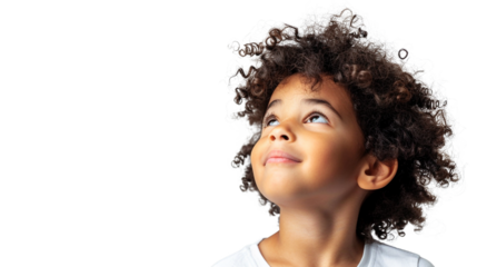 Adorable young child with a bright smile looking up with curiosity and wonder