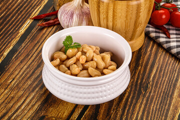 Baked white canned beans in the bowl