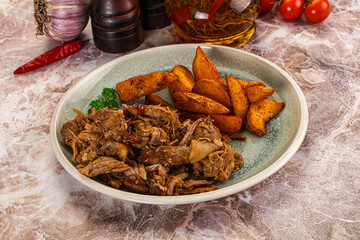 Baked shredded pork with potato