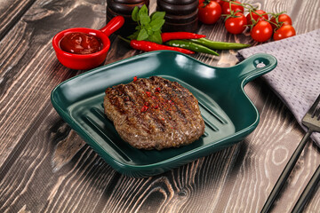Grilled beef burger cutlet with sauce