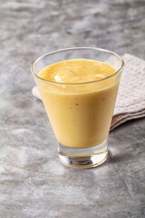 Sweet mango smoothie dessert glass