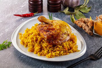 Roasted chicken leg with yellow rice