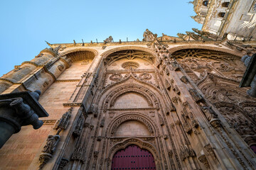 Naklejka premium Low angle view of ornate facade of Salamanca cathedral in spain