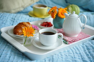 Cozy Breakfast Tray with Croissant, Berries, and Coffee