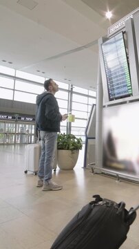 silhouette of People in airport terminal walking with luggage