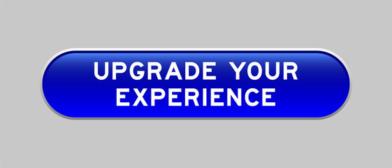 Blue color capsule shape button with word upgrade your experience on gray background