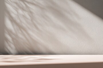 Abstract gray silhouette of tree branch. Beige light brown wall background. Transparent blur shade tropical leaves sunlight. Closeup of plant shadow motion. Natural light bokeh. Trend Overlay effect