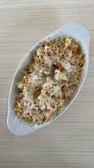 Curry rice and fish nuggets with mozzarella