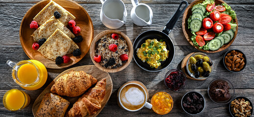 Breakfast served with coffee, eggs, cereals nd croissants