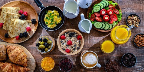 Breakfast served with coffee, eggs, cereals nd croissants