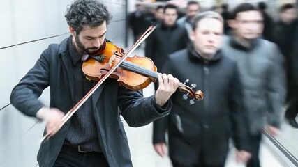 A musician performs on stage with a enthusiastic audience