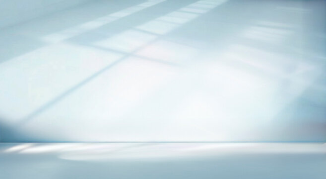 Shadow and light from windows on wall. Minimal abstract light blue background for product presentation.