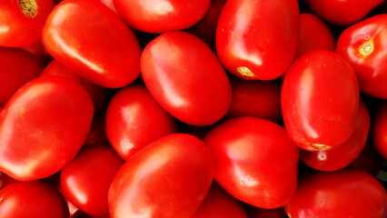 Bursa paste tomatoes make a great food background for photography, with their deep color and rich flavor. Their vibrant red tones are ideal for creating a striking visual composition
