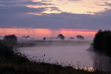 Misty dawn over the lake.