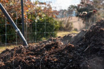 soil Compost pile, organic thermophilic compost turning in Tasmania Australia