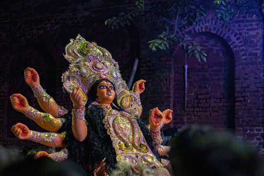 Durga puja with idol of goddess Durga during festival celebration. Idol being transported for visarjan ceremony during vijaya dashami or dussehra