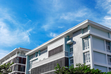 Modern residential building against clear blue sky