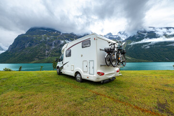 Family vacation travel RV, holiday trip in motorhome, Caravan car Vacation. Beautiful Nature Norway.