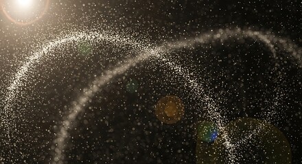 A dynamic display of light particles in motion against a dark backdrop, featuring swirling patterns and a luminous quality.