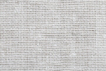 White burlap canvas with white linen fabric texture background

