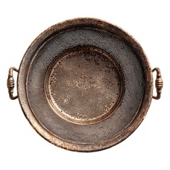 Antique metal colander, top view.  Rustic, aged copper-tone
