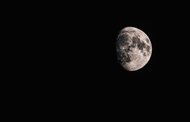half moon in the night sky
