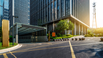 Modern office building with sleek design and well - paved entrance