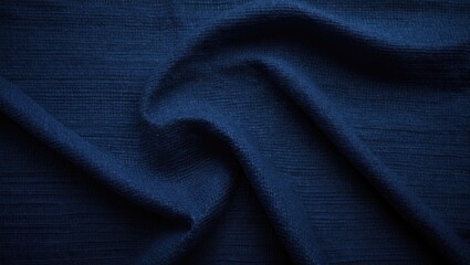Obraz premium Close-up of dark blue fabric with textured, wavy surface.