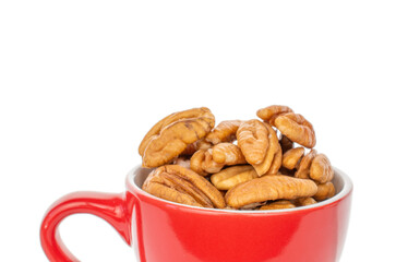 Peeled pecan nuts isolated on white background, close-up.