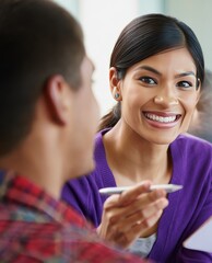 Woman Smiling and Taking Notes During Meeting