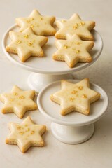 Fresh baked star-shaped holiday cookies cooling in white serving bowl