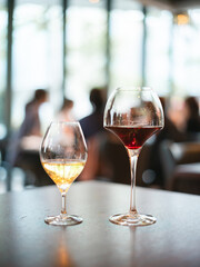 Two Glasses of Wine on Restaurant Table with Elegant Atmosphere