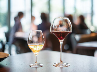 Two Glasses of Wine on Restaurant Table with Elegant Atmosphere
