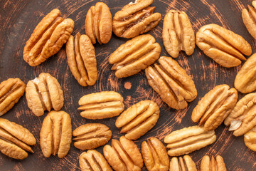 Shelled pecan nuts, top view, macro.
