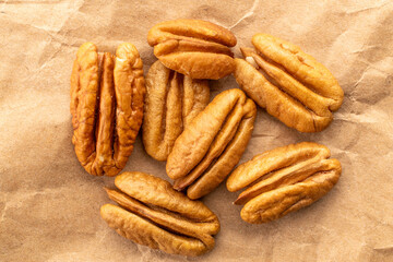 Shelled pecan nuts, top view, macro.