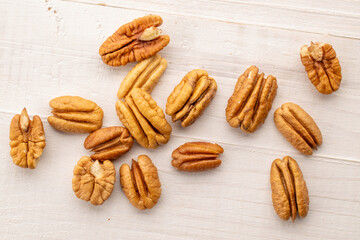 Shelled pecan nuts, top view, macro.