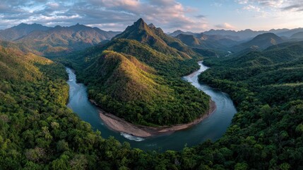 Panoramic shot of Peruvian Amazon selva peruana winding river surrounded by dense rainforest golden hour lighting adventure travel photography