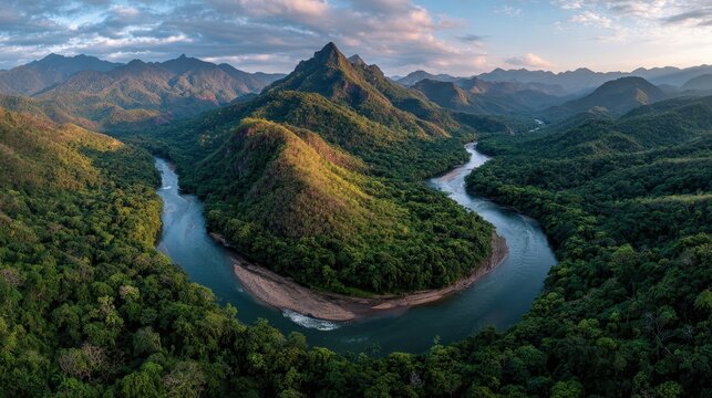 Panoramic shot of Peruvian Amazon selva peruana winding river surrounded by dense rainforest golden hour lighting adventure travel photography