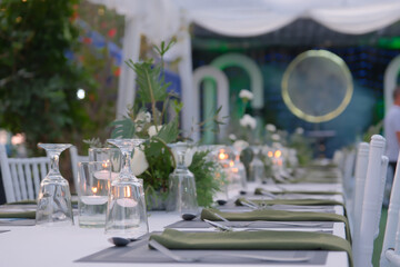 wedding reception dinner table suit at the garden in sunshine before event start