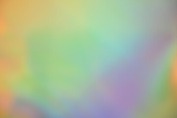 Abstract pastel colors gradient background. Blurred diffuse glare, iridescent background with shimmering reflections, holographic glow, prismatic light effects, and metallic sheen