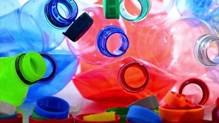 Empty colored drink bottles. Recyclable plastic waste.