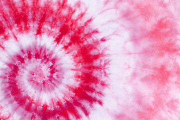 Abstract pink and red tie dye swirl pattern design textile background