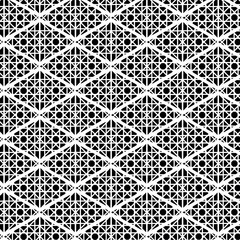 Abstract geometric pattern featuring interconnected diamonds and circles, creating a repeating, symmetrical design in black and white.