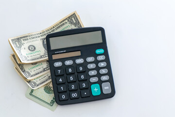 Calculator with Dollar Banknotes